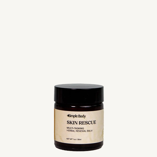 A jar of Simple Body Skin Rescue balm on a white background