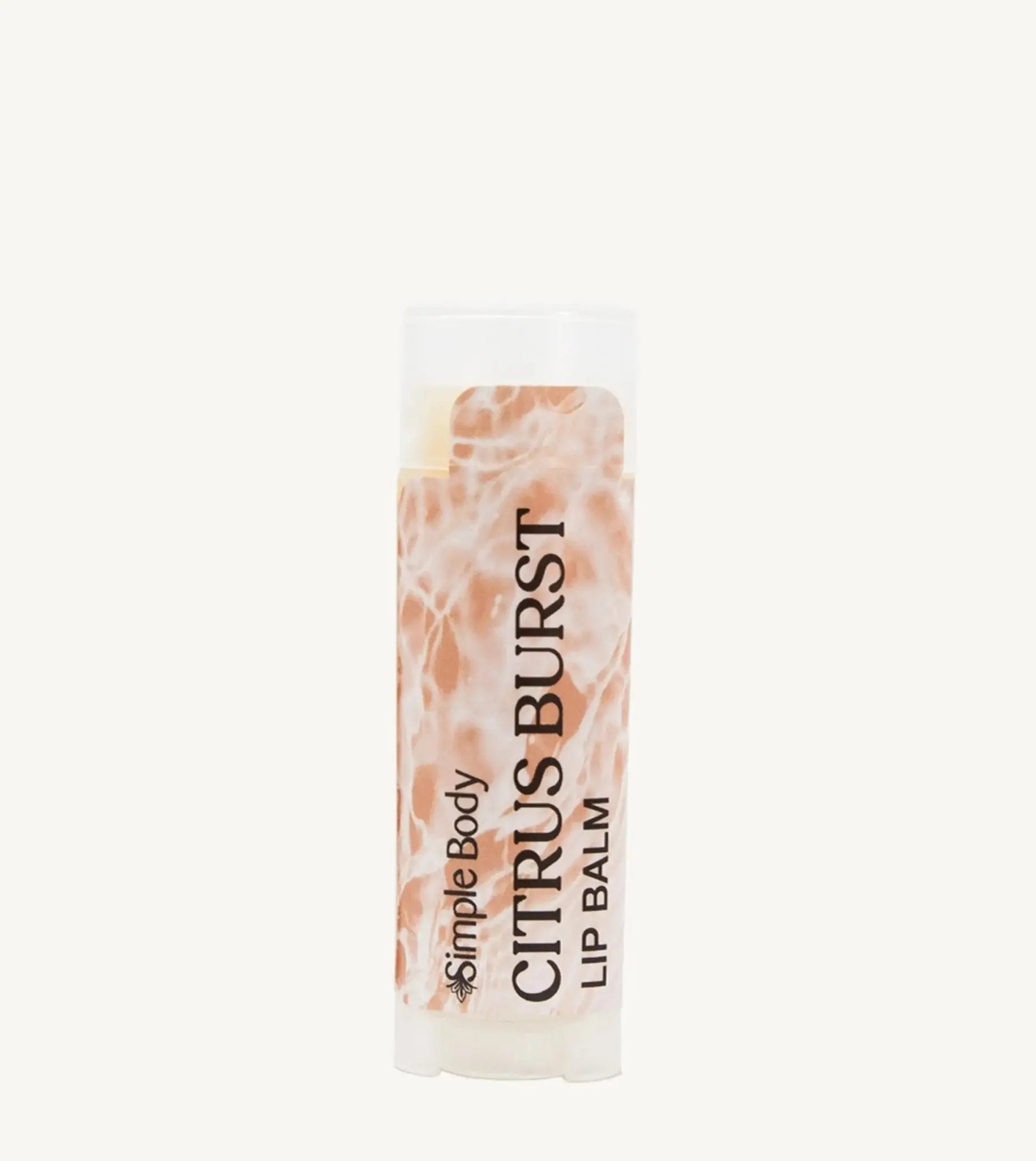 An oval lip balm tube with a label showing the product name, 'Citrus Burst Lip Balm', and the brand, 'Simple Body'. The background is off white.