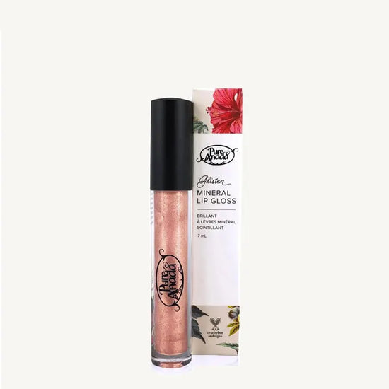 A photo of a tube of Pure Anada's Glisten Mineral Lip Gloss  with a shimmery peach color on a tan background.