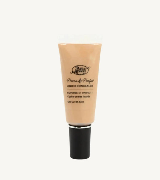 A photo of Pure Anada's Liquid Concealer in Ultra Fair which is a warm beige with yellow undertones on a tan background.