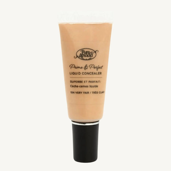 A photo of Pure Anada's Liquid Concealer in Very Fair which is a medium beige color in a tube with a black top. 