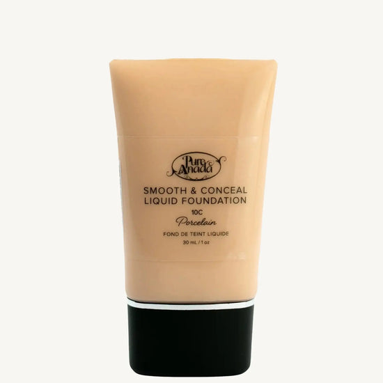 A bottle of Pure Anada Smooth & Conceal Liquid Foundation in Porcelain 10C color which is a cool beige color with pink undertones on a white background.