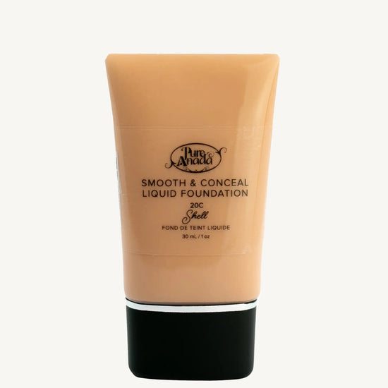 A bottle of Pure Anada Smooth & Conceal Liquid Foundation in Shell 20C which is for light skin with cool or pink undertones on a white background.