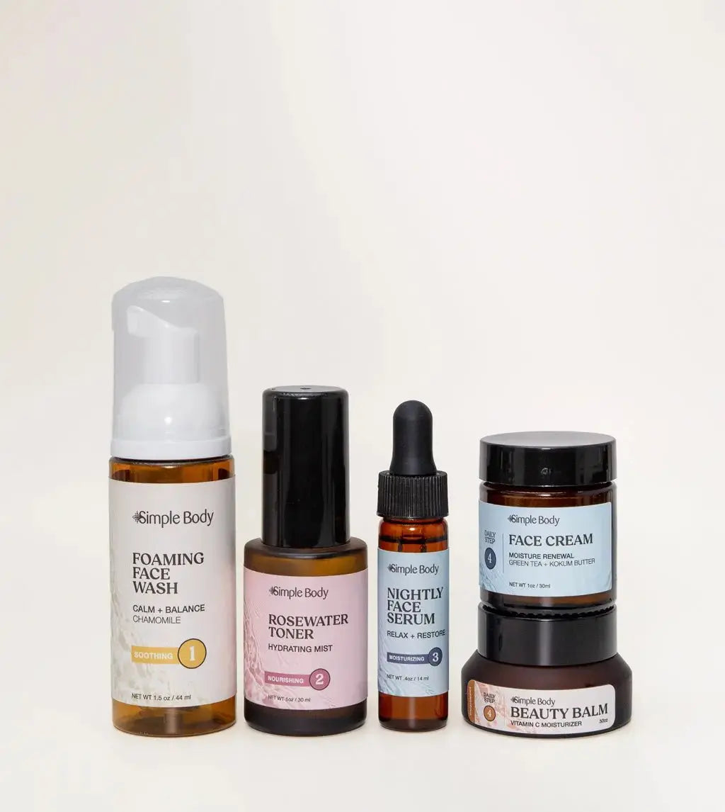 A Mini Starter Skincare kit for sensitive skin including a Foaming Face Wash, Rosewater Toner, Nightly Face Serum, Face Cream, and Beauty Balm on a light tan background.