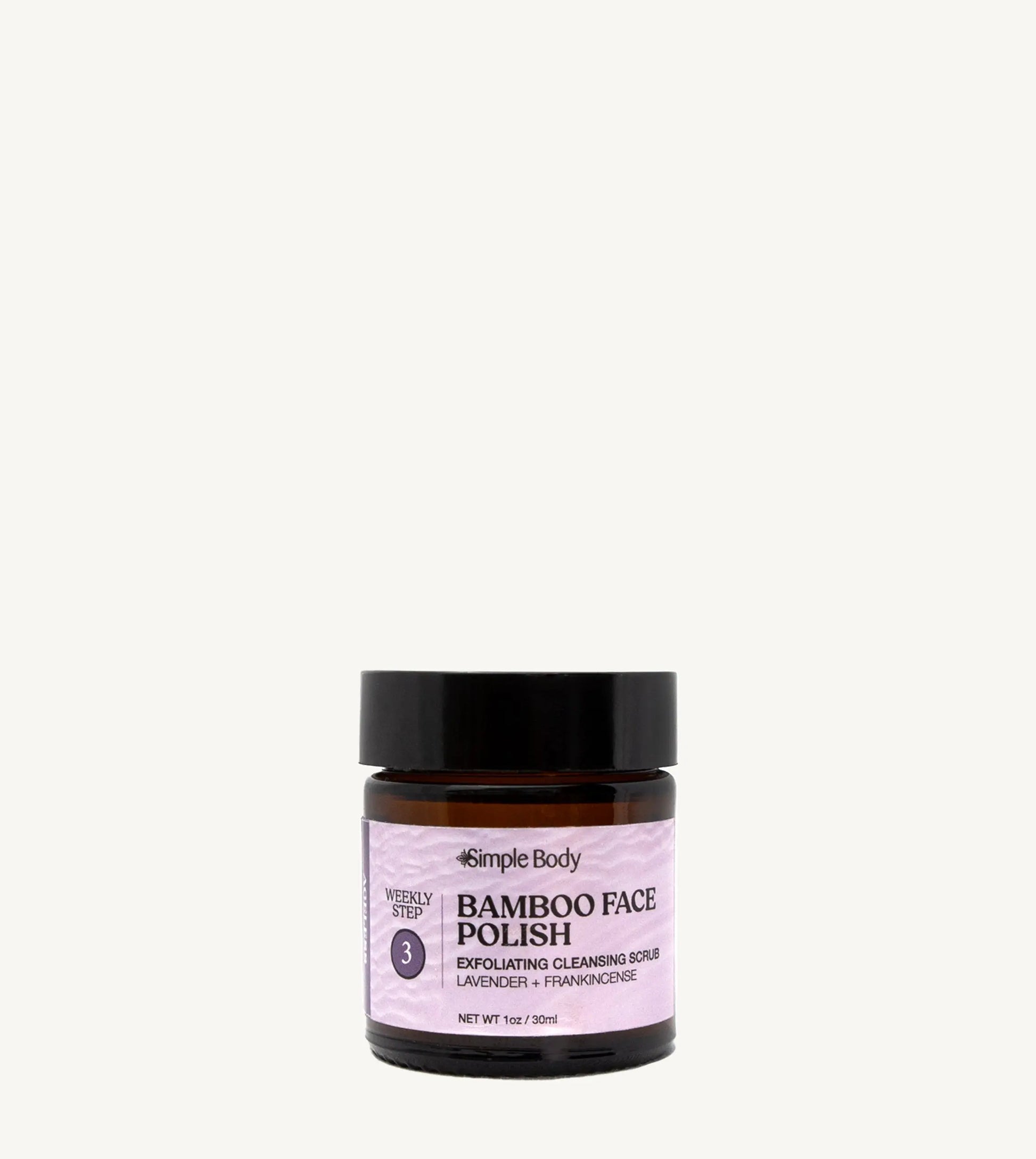 A jar of Simple Body Bamboo Face Polish with the label facing forward. The label indicates that it is an exfoliating cleansing scrub with Lavender & Frankincense.