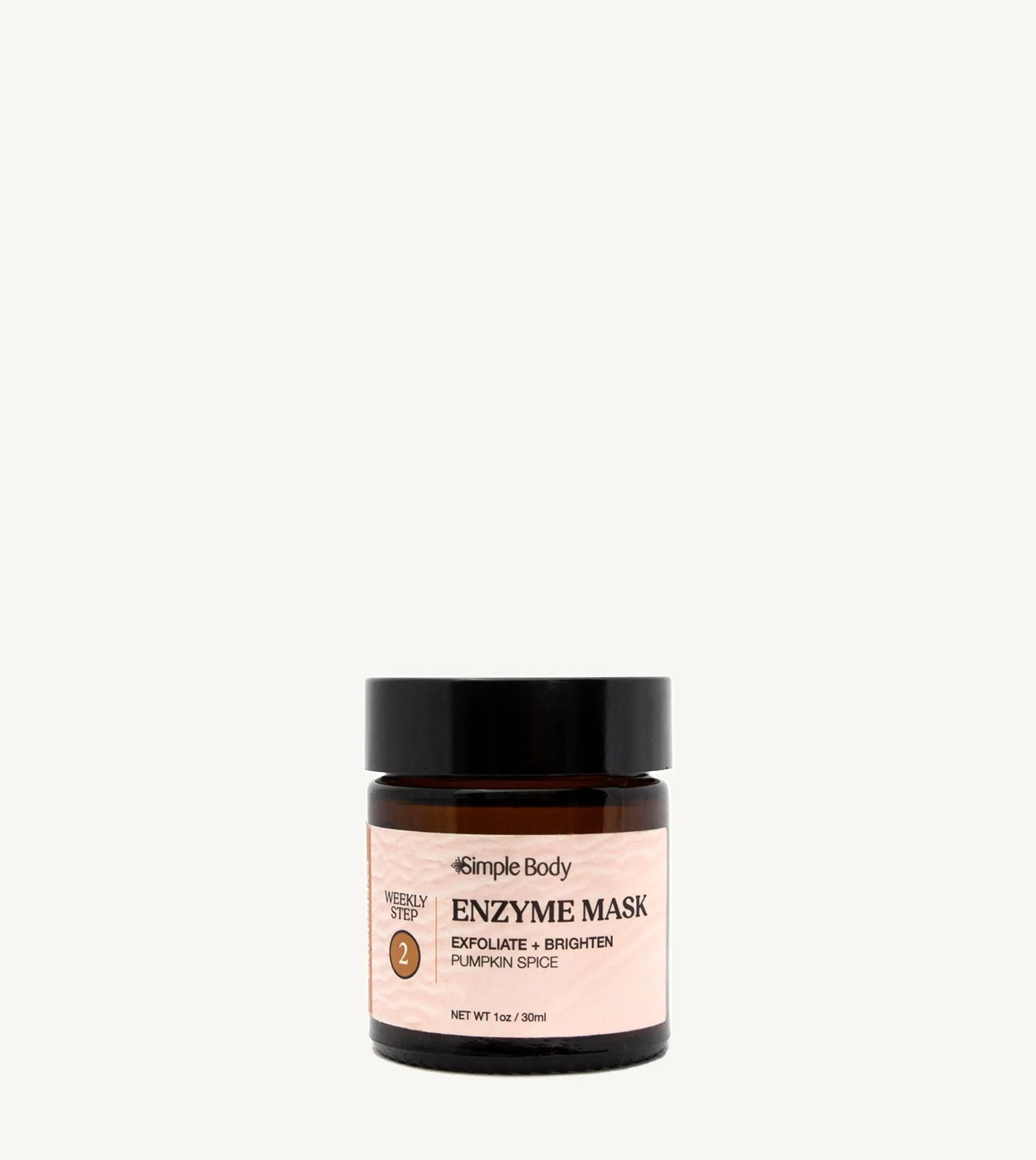A black and clear glass jar with a label that reads 'Enzyme Mask' and indicates the product is for exfoliating and brightening the skin. The jar is set against a white background.