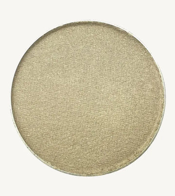 A photo of Pure Anada's Pressed Eye Color in Mirage which is a silvery gray-green color on a tan background.