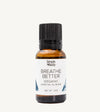 Bottle of Simple Body 'Breathe Better' organic essential oil blend on a white background