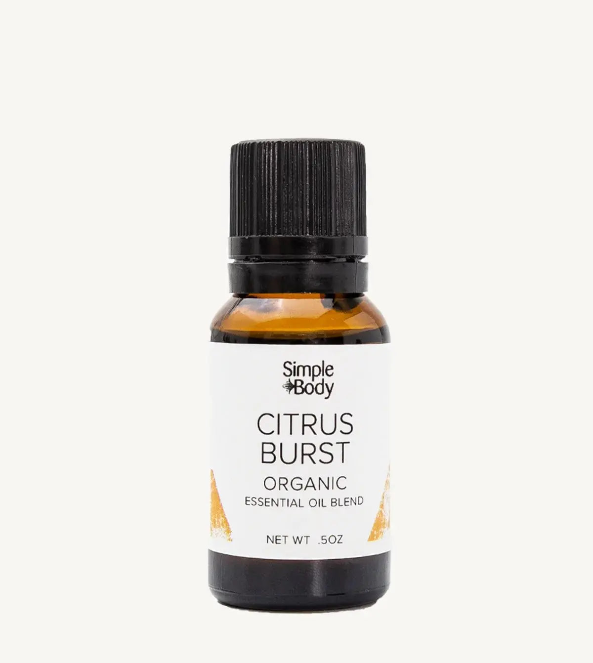 Bottle of Simple Body Citrus Burst organic essential oil blend on a white background