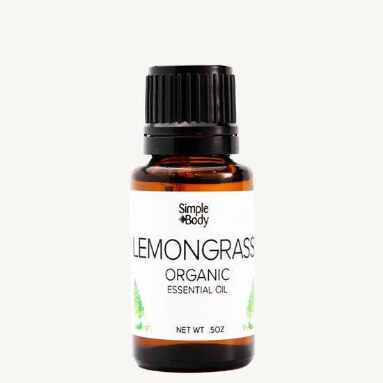 Bottle of Simple Body Lemongrass organic essential oil on a white background