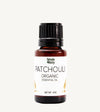 Bottle of Simple Body Patchouli Organic Essential Oil on a white background