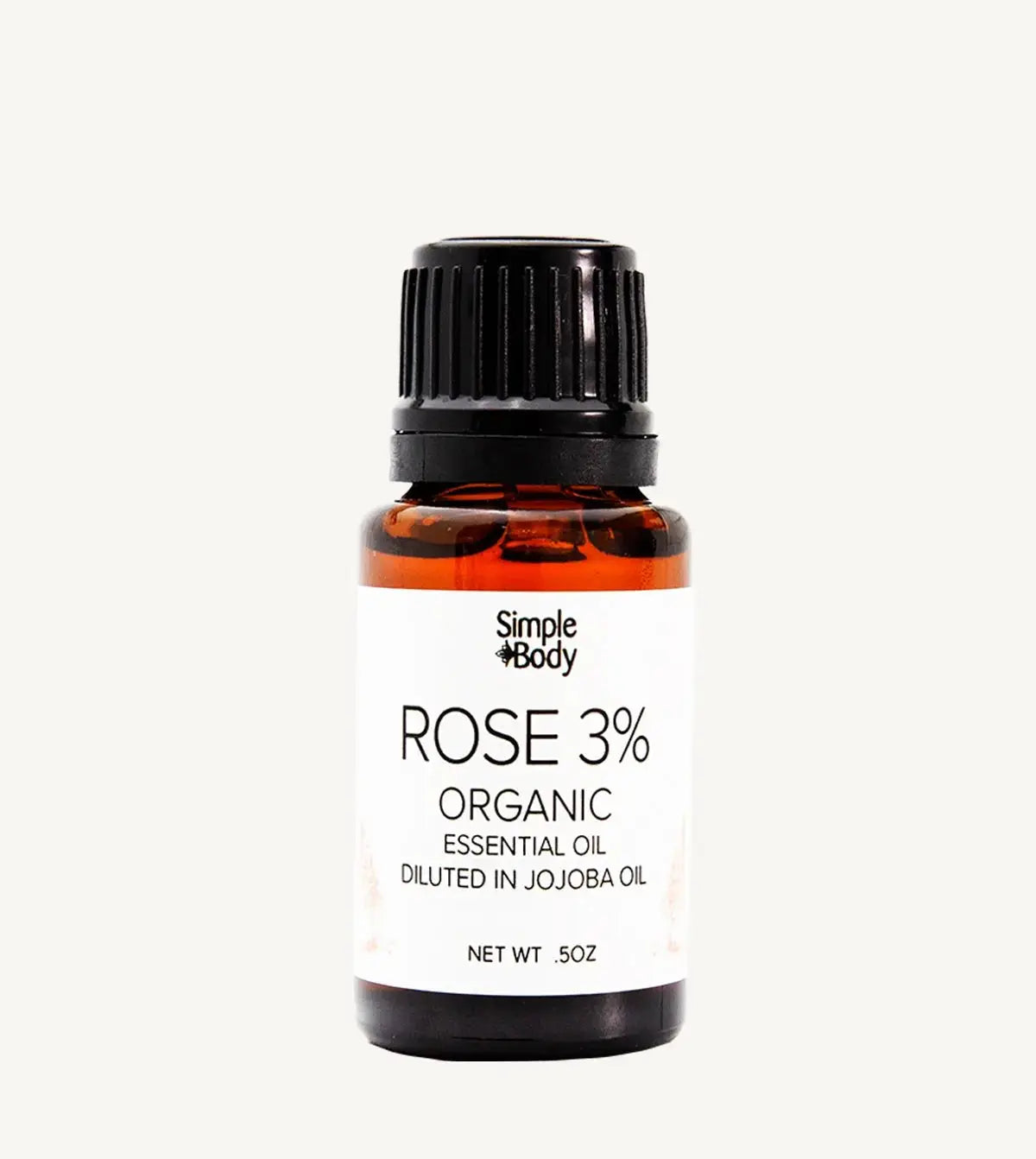 Bottle of Simple Body Rose 3% Organic Essential Oil on a white background
