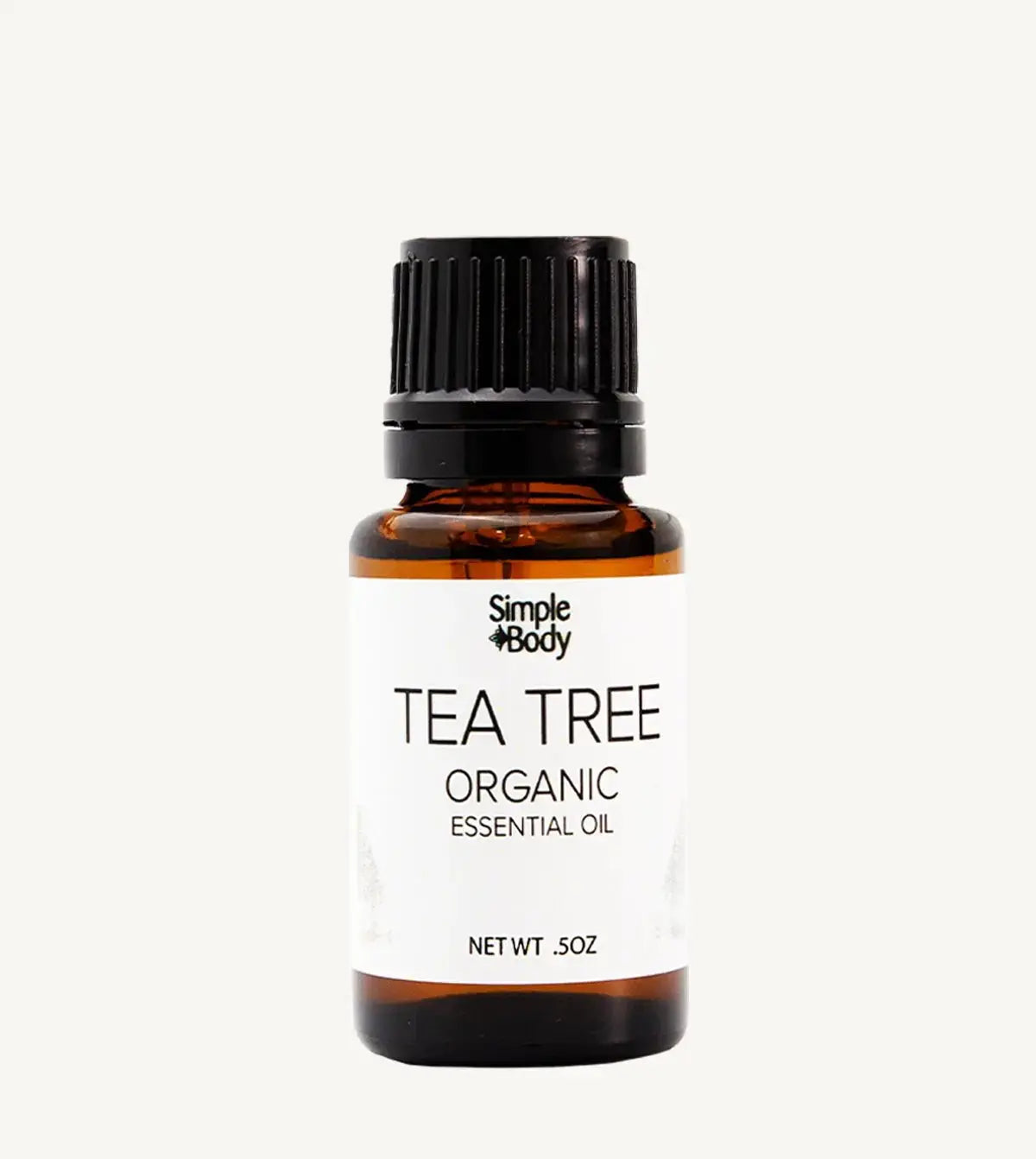 Tea tree organic essential oil bottle with a white background