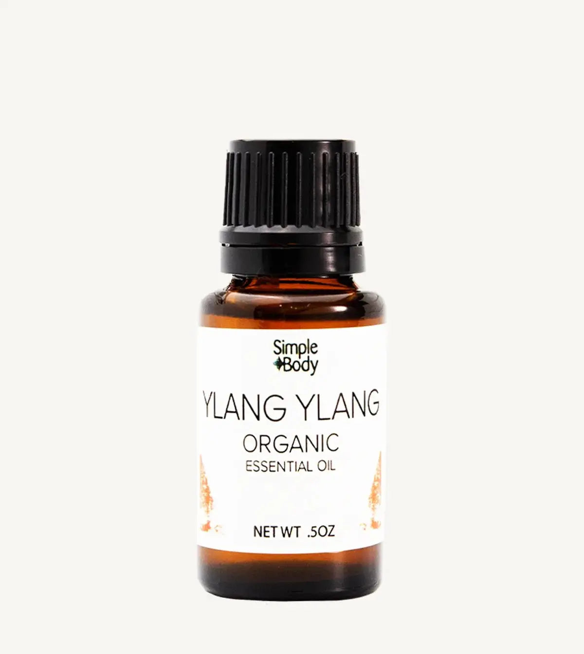 Bottle of Simple Body Ylang Ylang Organic Essential Oil on a white background