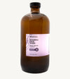 Brown bottle of Simple Body's foaming face wash refill in Lavender for relaxing and soothing with a purple label on a white background