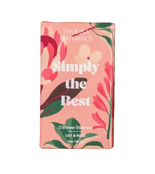 A photo of a beautiful pink box with floral illustrations and Thulisa Naturals logo at the top with "Simply The Best" and 2 Shower Steamers Lily & Rose type on the front of the box on a white background.