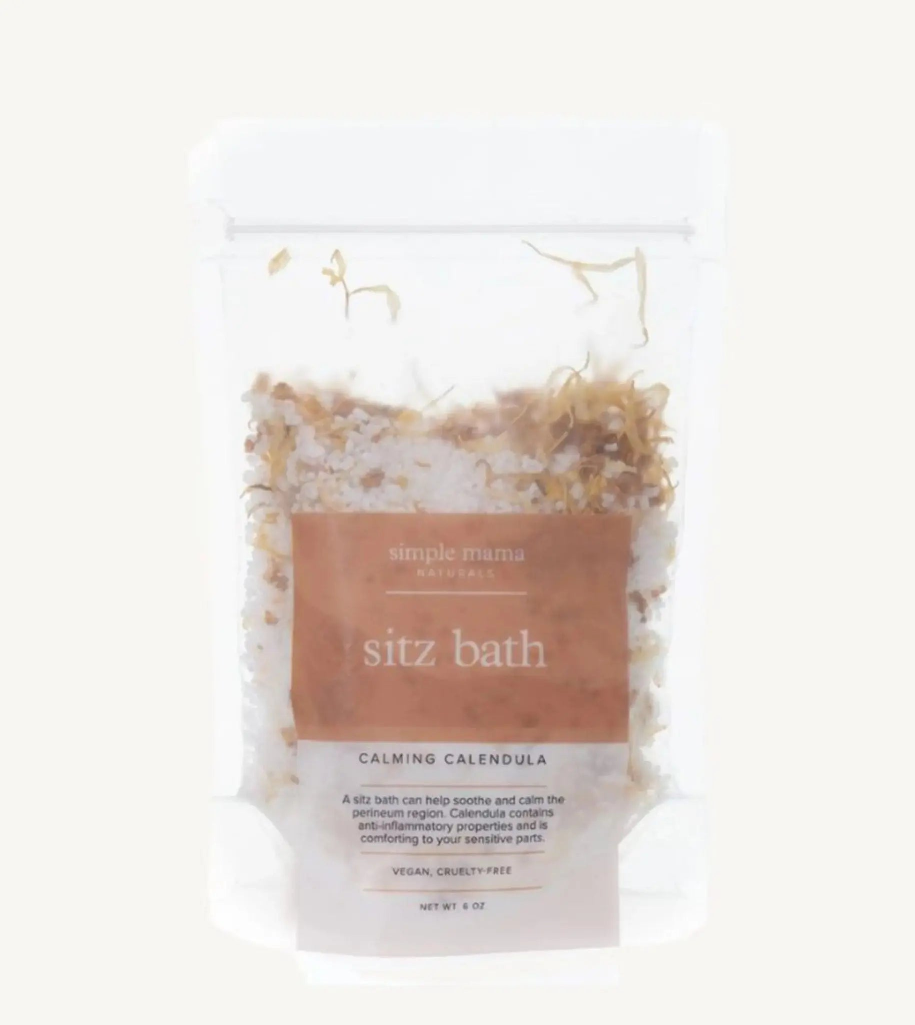 A package of Simple Mama Sitz Bath Calming Calendula, with visible natural botanicals inside a clear plastic bag.