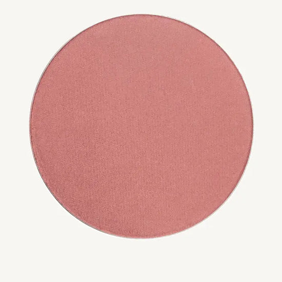 An image of Pure Anada's Tender Twig Cheek Color which is a Dusty Rose color and round.