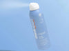 thinksport sunscreen spray bottle on a light blue background