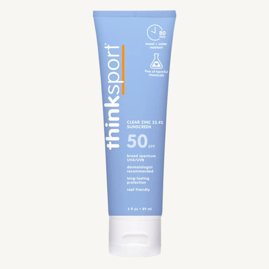 Blue tube of thinksport sunscreen on a white background