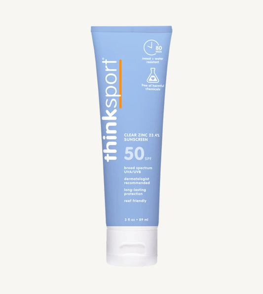 Blue tube of thinksport sunscreen on a white background