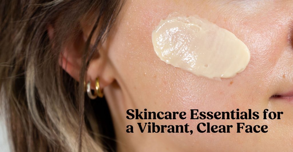 A photo of clear skin that is glowing and has a swatch of face cream applied.