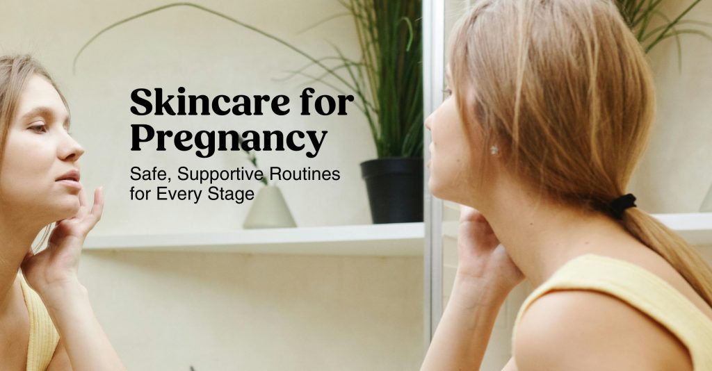 A pregnant woman looks in the mirror as she applies skincare