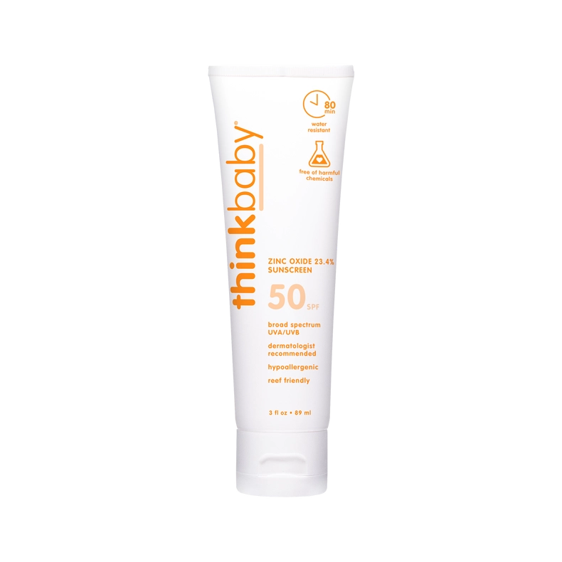 A photo of a white bottle with orange lettering of the ThinkBaby sunscreen SPF 50