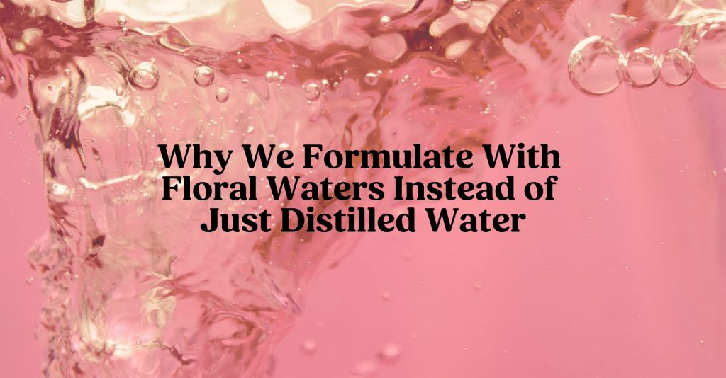 a photo of pink rose floral water swirling around