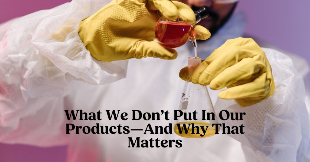 An image of a chemist with yellow work gloves and a protective covering mixing toxic cosmetic ingredients