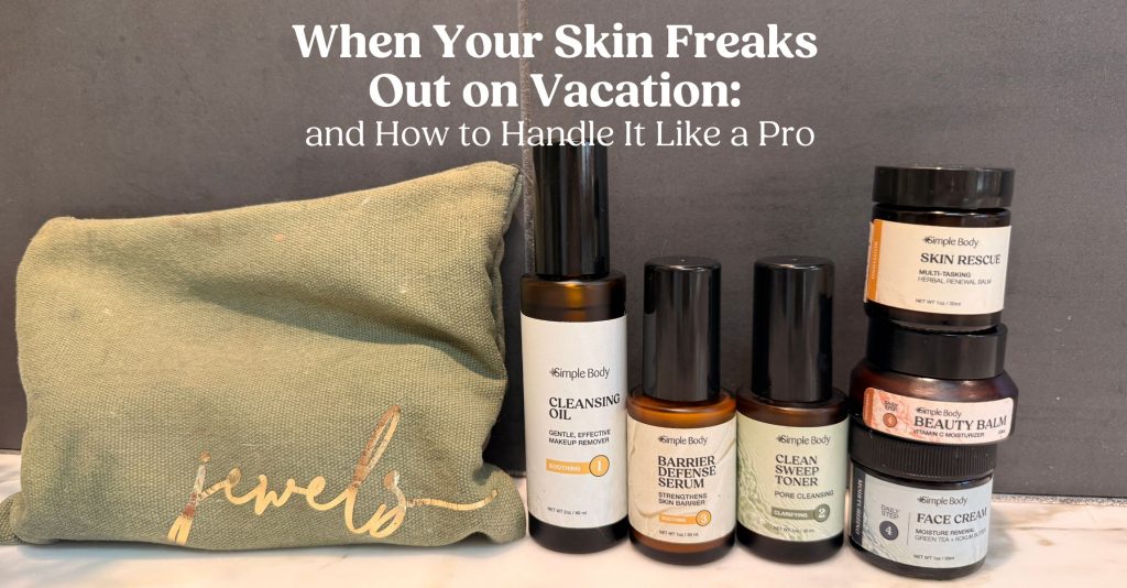 A photo of a dark green cosmetic travel bag with the name "Jewels" in gold sitting next to a Cleansing Oil, Barrier Defense, Clean Sweep Toner, Skin Rescue, Beauty Balm, and Face Cream