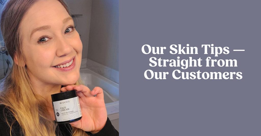 A photo of a happy, smiling woman holding a jar of Simple Body Face Cream