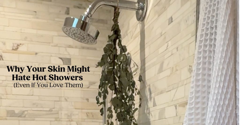 A photo of a beautiful chrome showerhead with eucalyptus hanging and a white cotton waffle weave towel hanging