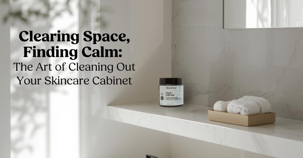 A photo of a clean, white, bathroom with minimal things on the shelf, just one Simple Body Face Cream, a white towel and a bamboo soap tray