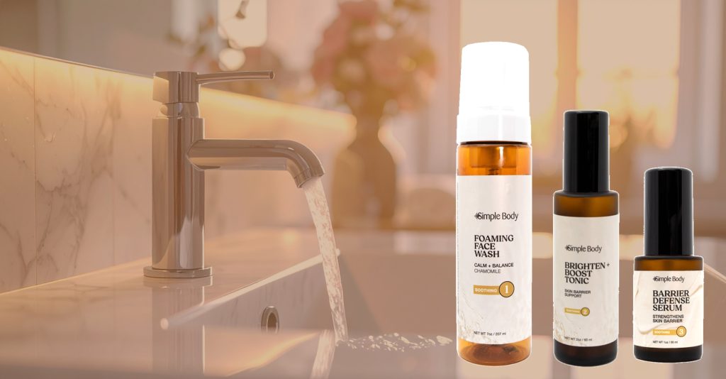 A photo of Simple Body products inlcuding Foaming Face Wash Chamomile, Brighten and Boost, and Barrier Defense Serum on a sink background faded out.